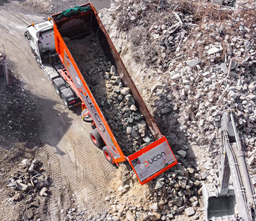 Dump truck unloading rubble