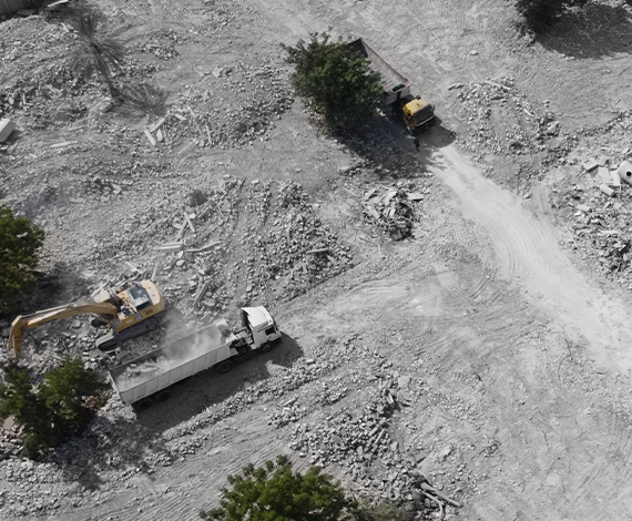 Aerial view of construction site with excavators